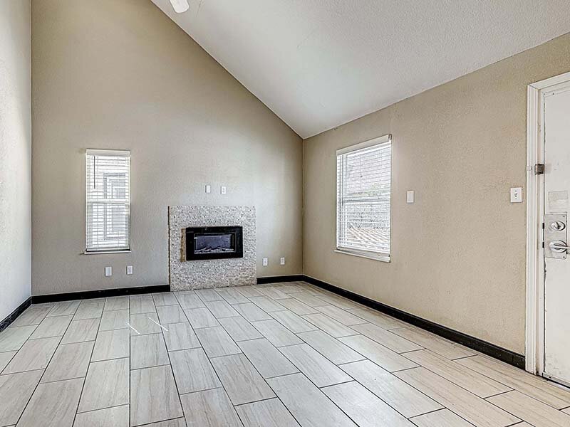 Living Room with Fireplace and Window | Avia Lofts at Founders Road