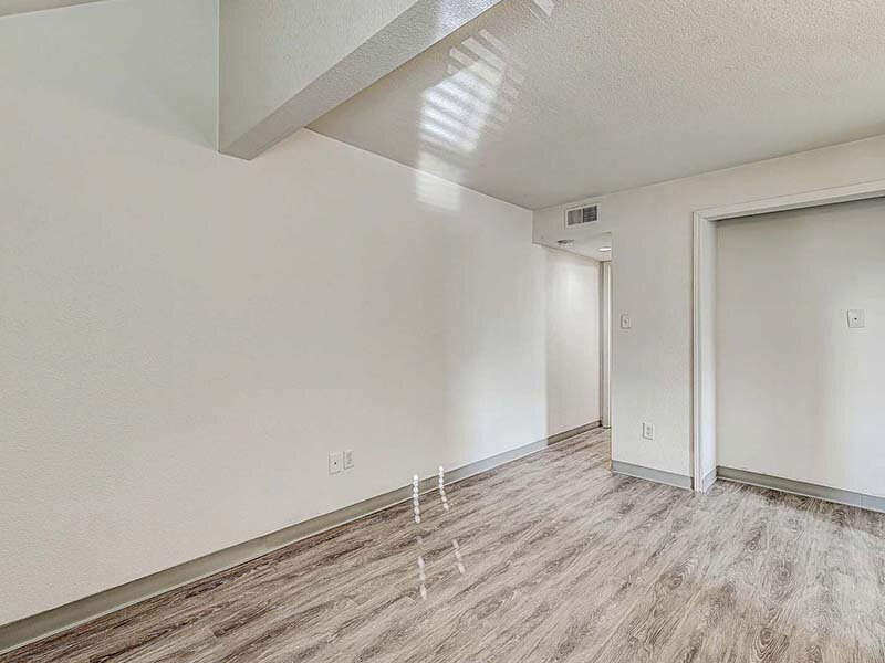 Apartment View of Bedroom with Wood Style Flooring | Avia Lofts at Founders Road