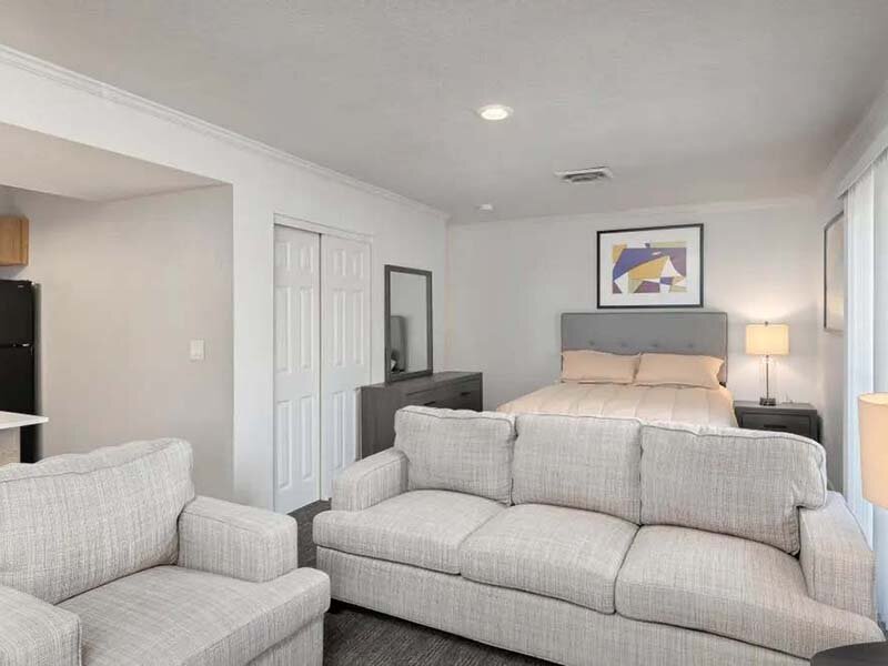 Living Room with Seating and Wall Art | Avia at 110th St