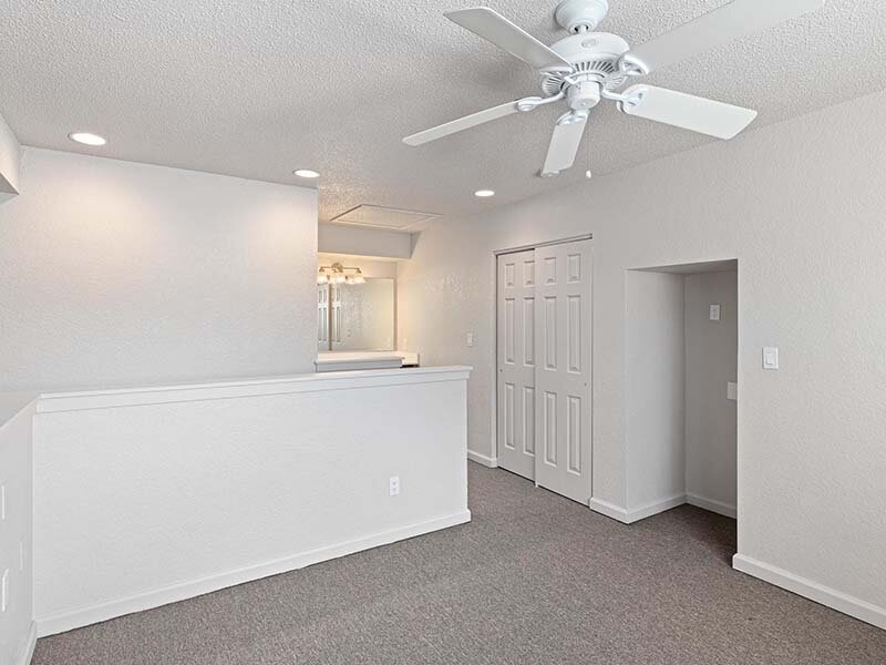Apartment Space with Ceiling Fan and Lights | Avia at 110th St