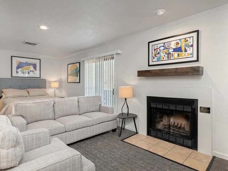 Apartment Living Room with Fireplace and Wall Art | Avia at 110th St