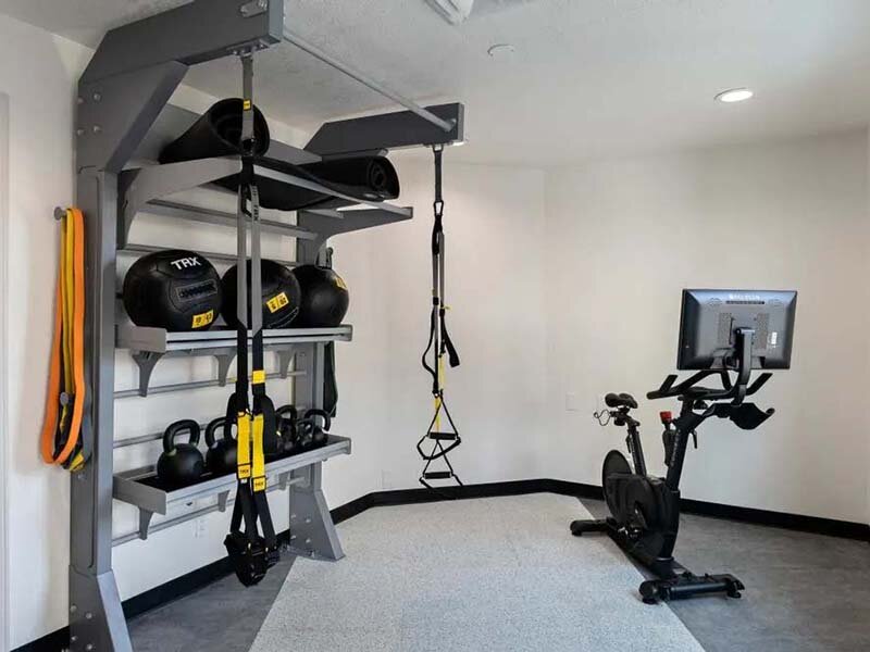 Community Exercise Room with Weights | Avia at 110th St