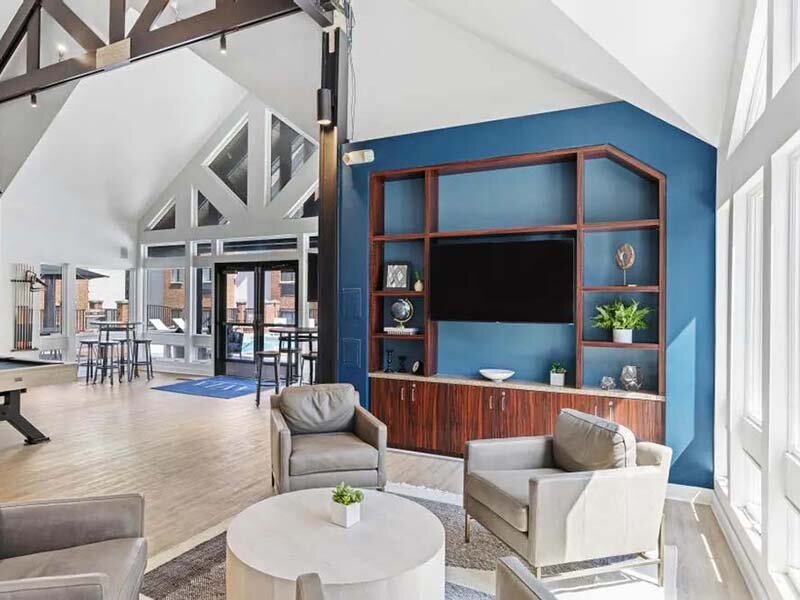 Community Clubhouse with Seating and Television | Avia on College Boulevard