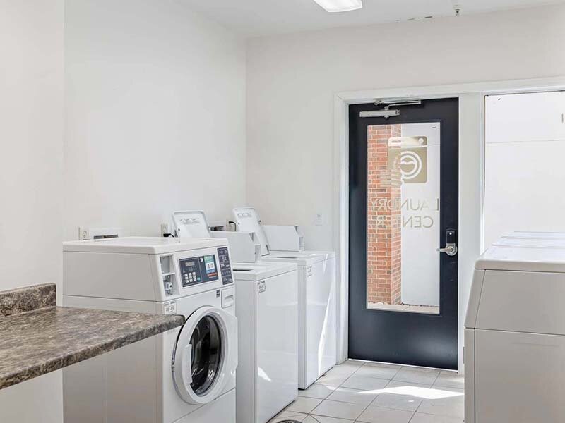 Entrance to Laundry Room with Tile Style Flooring | Avia on College Boulevard