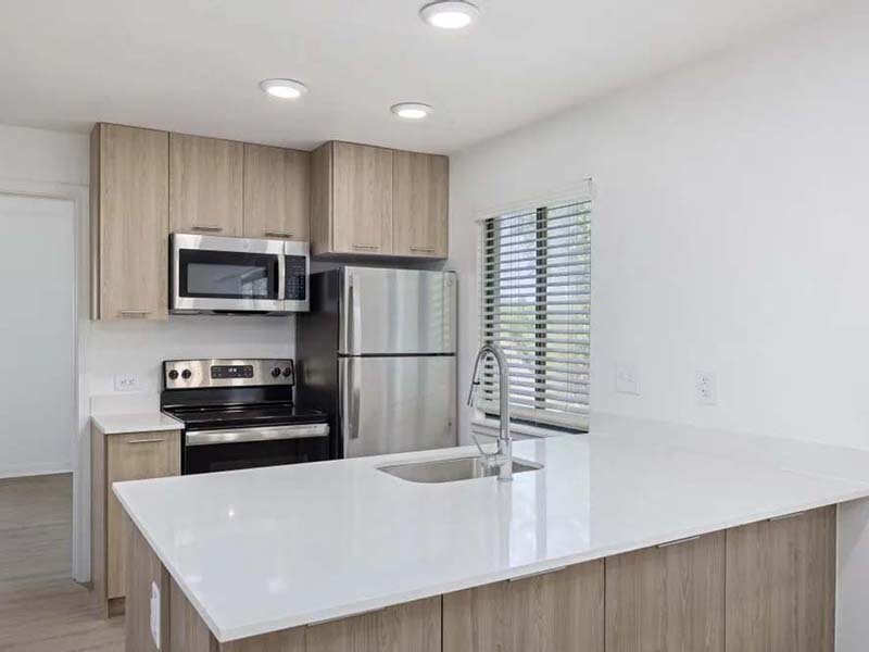 Apartment Kitchen with Window and View of Kitchen Sink | Avia on College Boulevard