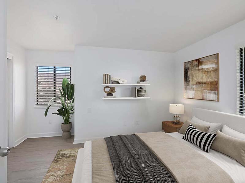Apartment Bedroom with Wall Art and Lamp | Avia on College Boulevard