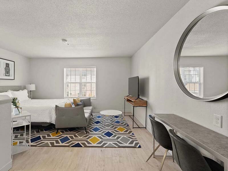 Interior Bedroom with Mirror and Window | Avia Lofts at North Shore