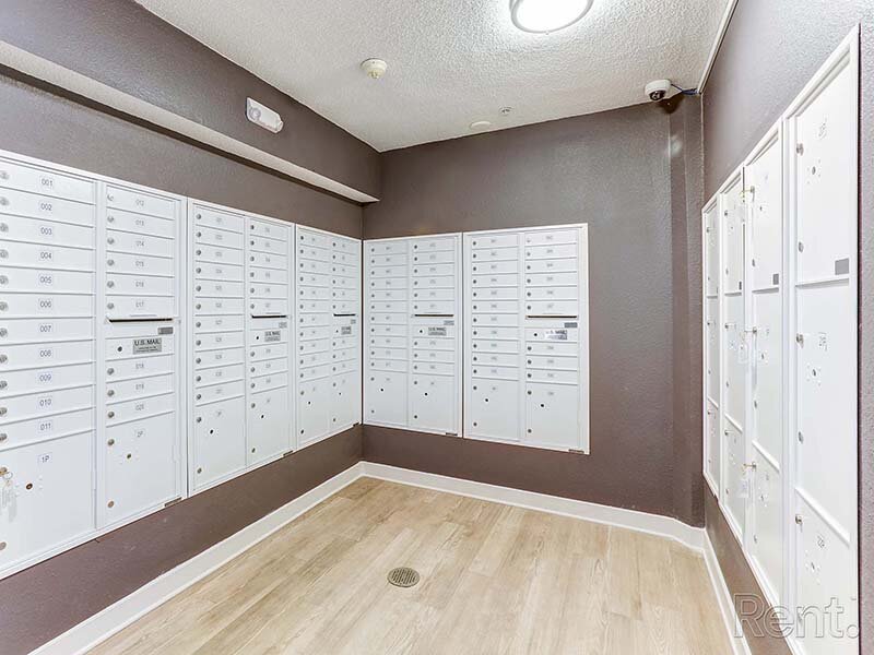 Parcel Lockers with Ceiling Lights and Wood Style Flooring | Avia Lofts at North Shore