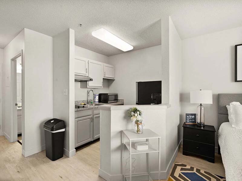 Kitchen with Ceiling Light and Wood Style Flooring | Avia Lofts at North Shore