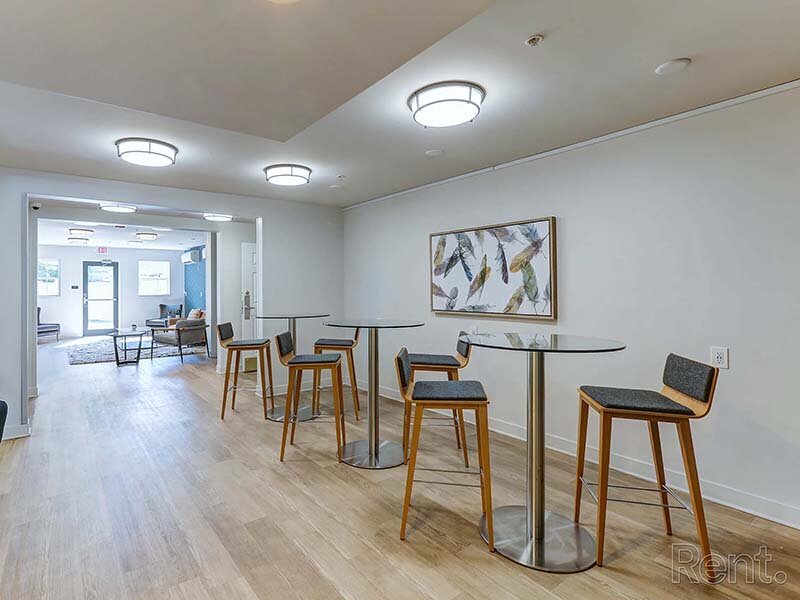 Community Dining Area with Ceiling Lights | Avia Lofts at North Shore