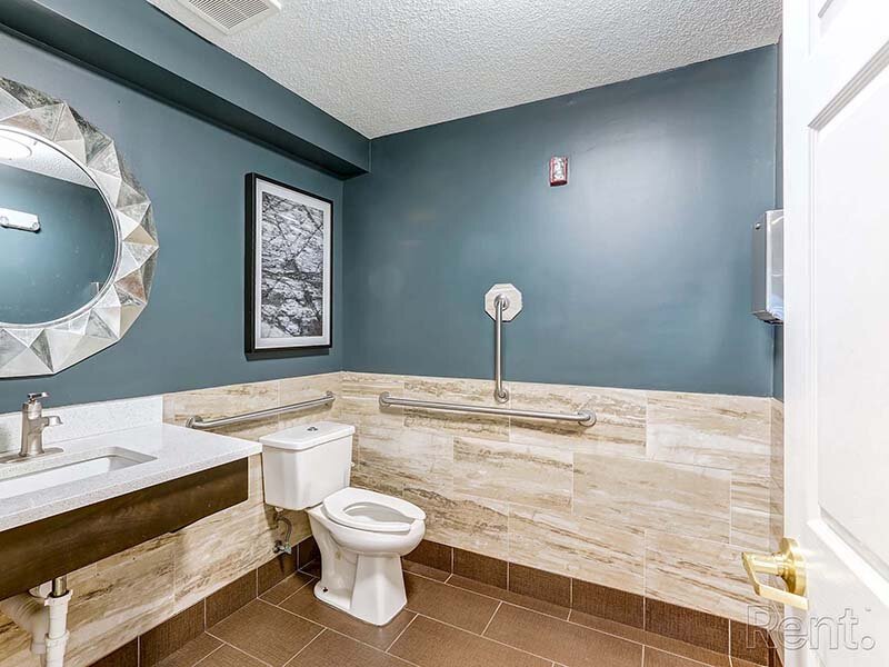 Community Clubhouse Bathroom and Wall Art | Avia Lofts at North Shore