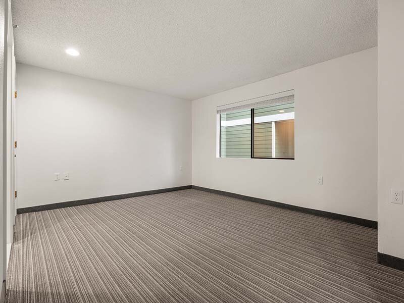 Bedroom with Ceiling Light and Window | Avia Lofts on Parkway