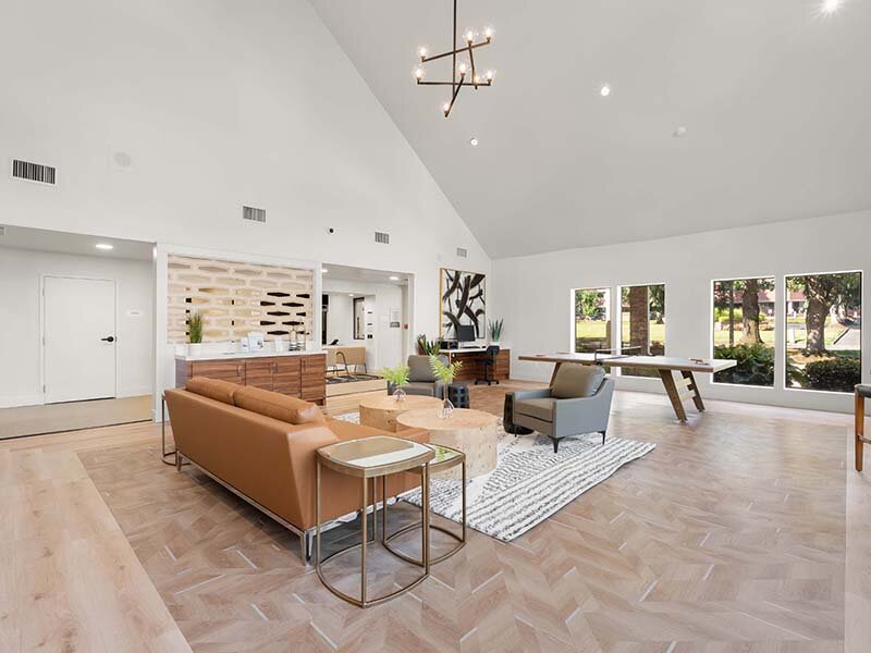 Clubhouse with Ample Seating and Chandelier | Avia Lofts on Parkway