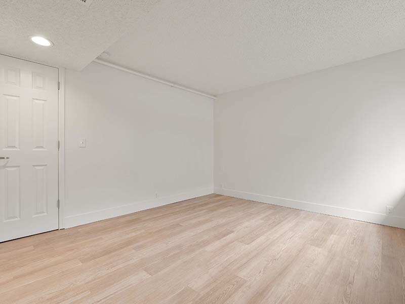 Bedroom with Wood Styled Flooring | Avia Lofts on Parkway