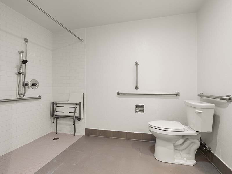 Bathroom with Railing and Shower | Avia Lofts on Parkway