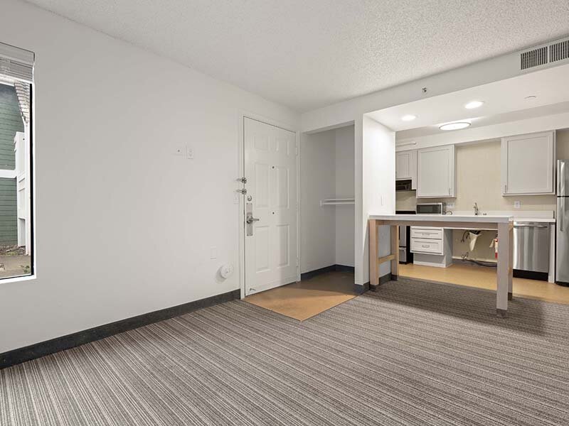 Apartment Entrance with Views of Kitchen and Kitchen Table | Avia Lofts on Parkway