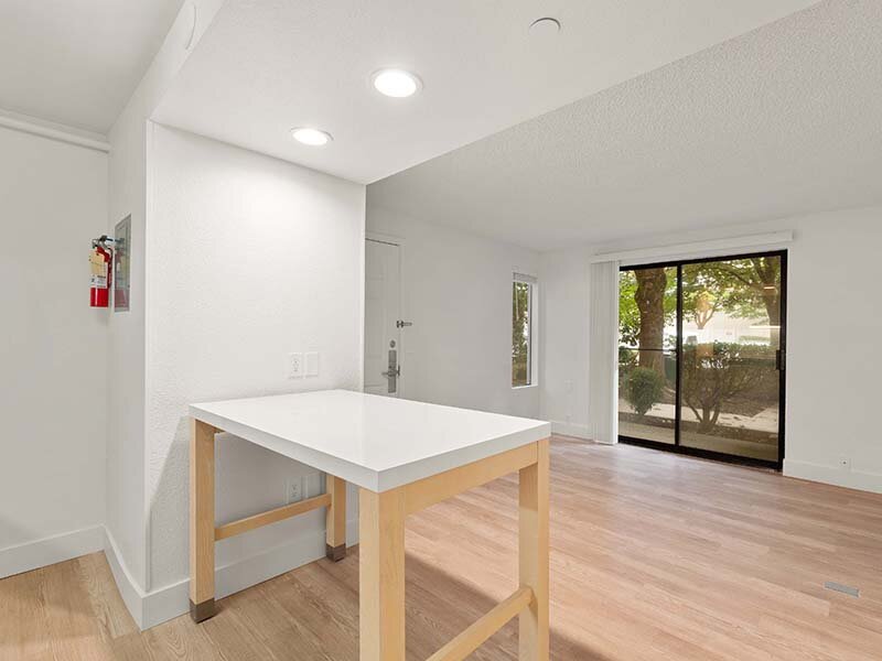 Apartment Interior Room with Window and Table | Avia Lofts on Parkway
