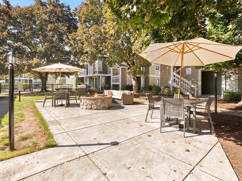 Exterior Views of Apartment Complex with Patio Seating | Avia Lofts on Parkway