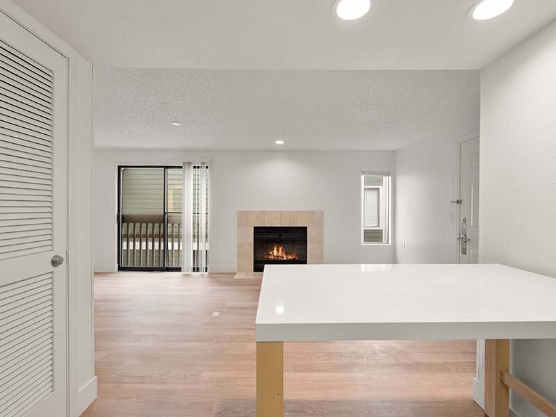 Interior Living Room with Fireplace and Wood Style Flooring | Avia Lofts on Parkway