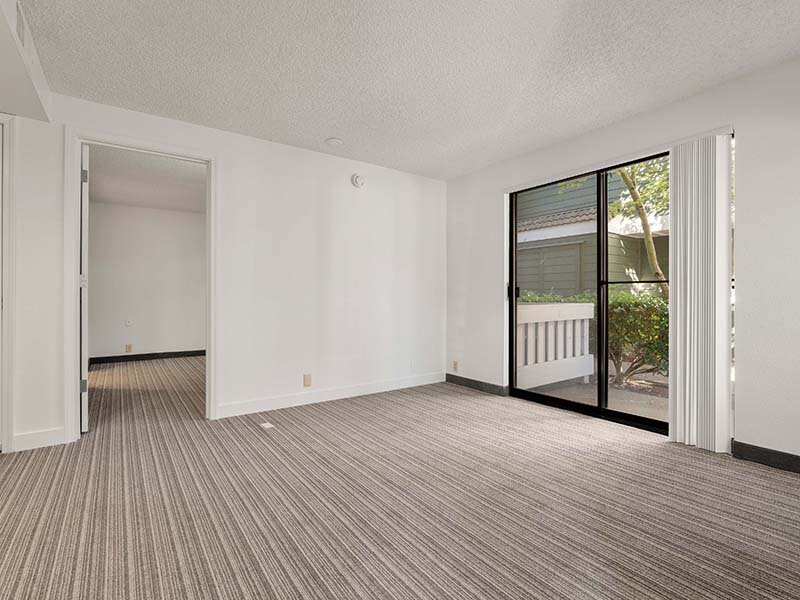 Views of Living Room and Entrance to Patio | Avia Lofts on Parkway