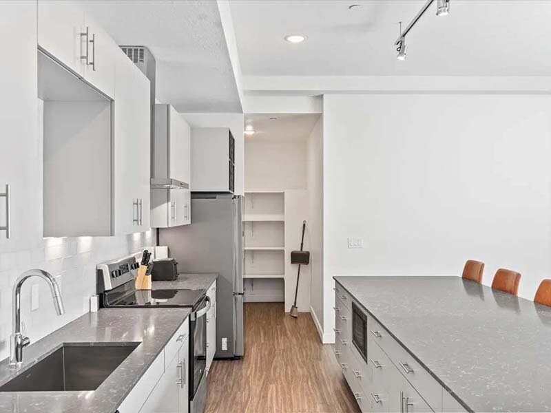 Kitchen with Wood Like Flooring | Paperbox Lofts