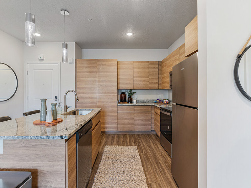 Kitchen with Prep Island | Flats at Riverwoods