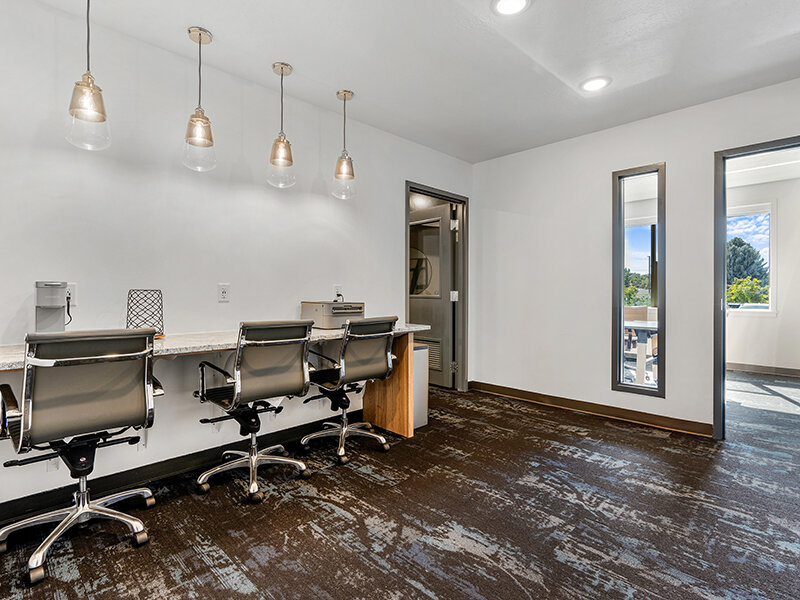 Business Center | Flats at Riverwoods