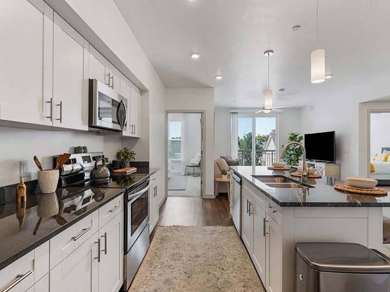 Kitchen Appliances with Window and Wood Style Cabinets | City View St. George