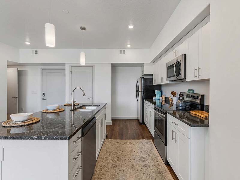 Kitchen with Ceiling Lights and Wood Style Flooring | City View St. George