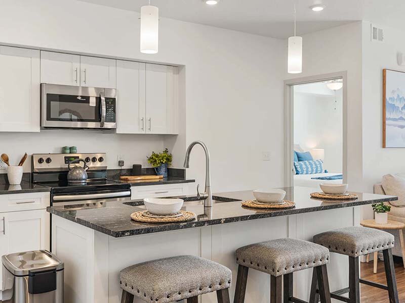 Kitchen Sink with Seating and Ceiling Lights | City View St. George