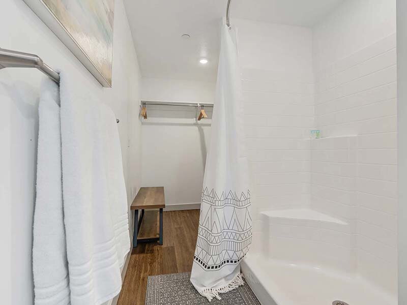 Apartmetn Walk In Shower with Wood Style Flooring | City View St. George