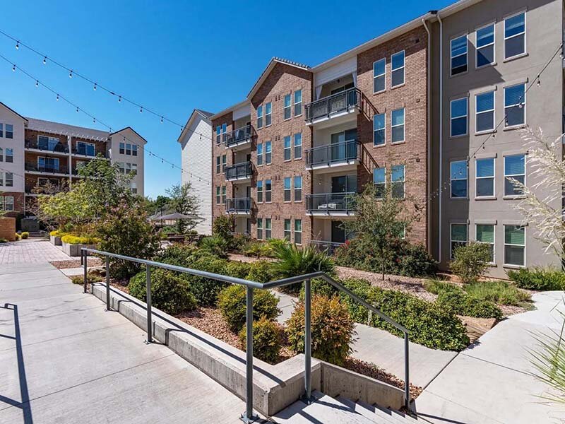 Apartment Building with Walking Path and Landscaping | City View St. George