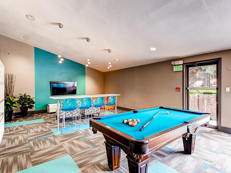 Clubhouse Pool Table | 3300 Tamarac Apartments in Denver CO