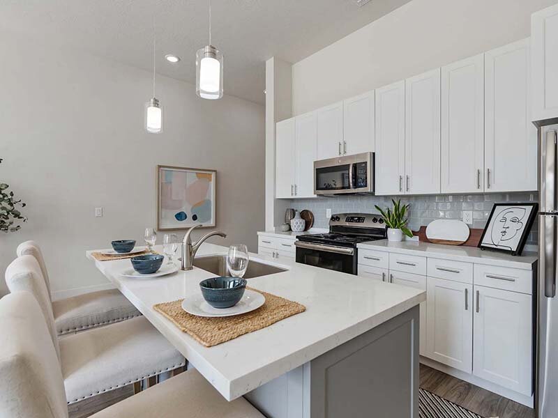 Kitchen with Wood Style Cabinets and Counter | 200 City View