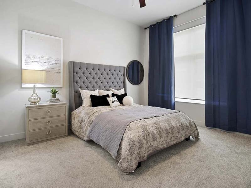 Apartment Bedroom with Window and Carpeted Flooring | 200 City View