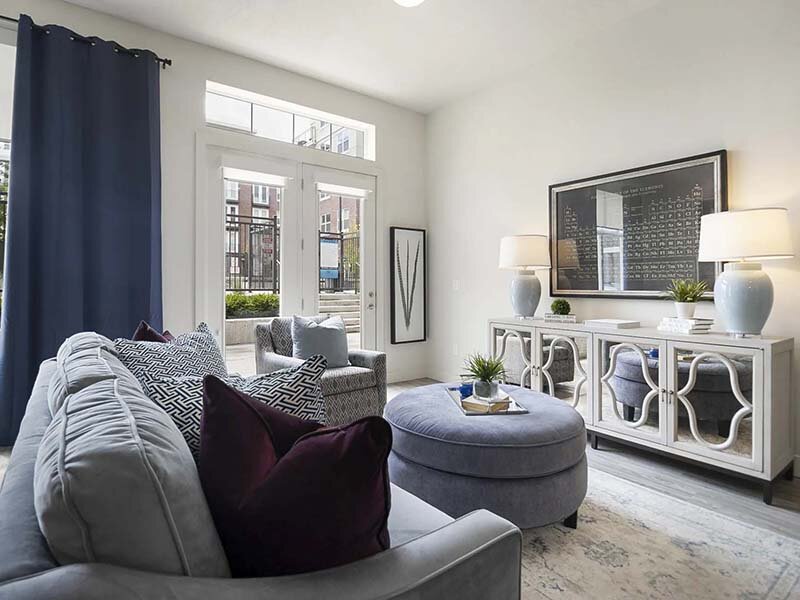 Living Room with Wall Art and Carpeted Flooring | 200 City View
