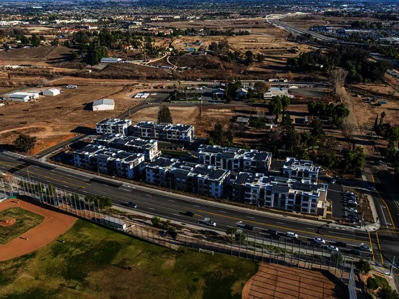 Aerial View of City near Apartment Complex | Monamos Terrace