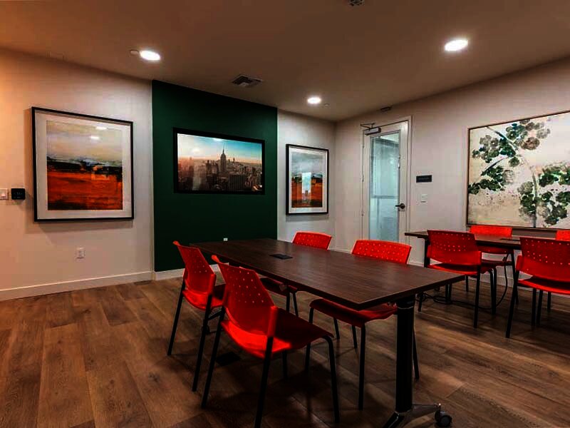 Community Seating with Ceiling Lights and Wood Style Flooring | Monamos Terrace