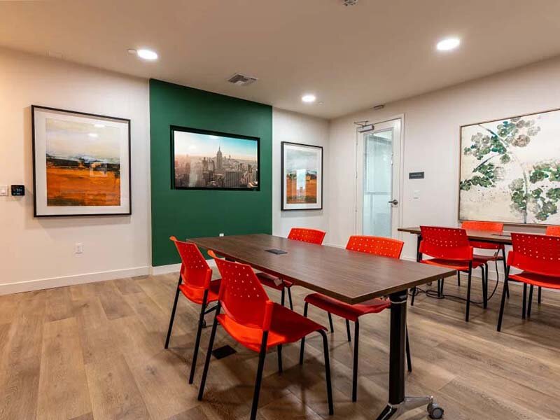 Community Seating with Ceiling Lights and Wood Style Flooring | Monamos Terrace