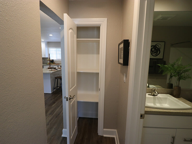 Apartment Closet with View of Bathroom | Pentagon