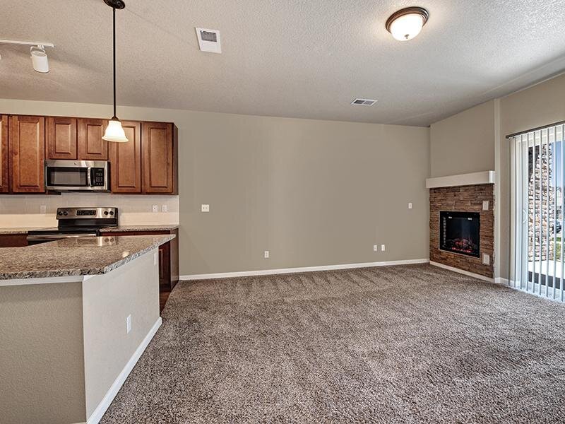 Living Room & Kitchen | The Highlands at Red Hawk