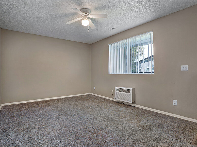 Carpeted Room with Ceiling Fan | Sienna Place
