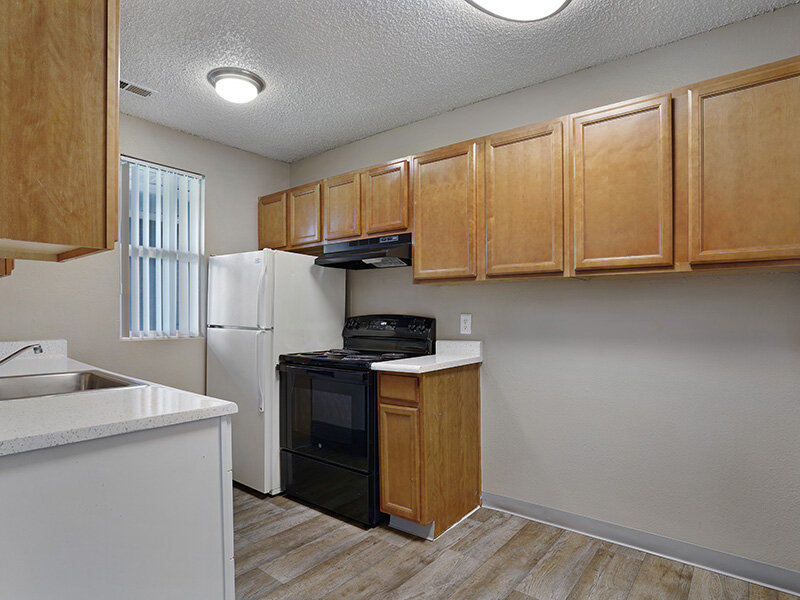 Kitchen with Wood Flooring | Sienna Place