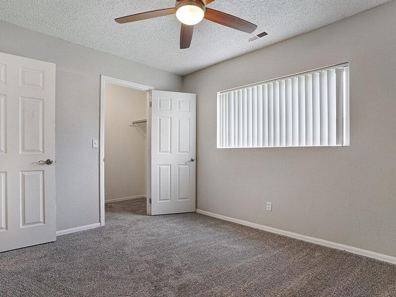 Bedroom with Carpeted Floors and Ceiling Fan | Sienna Place