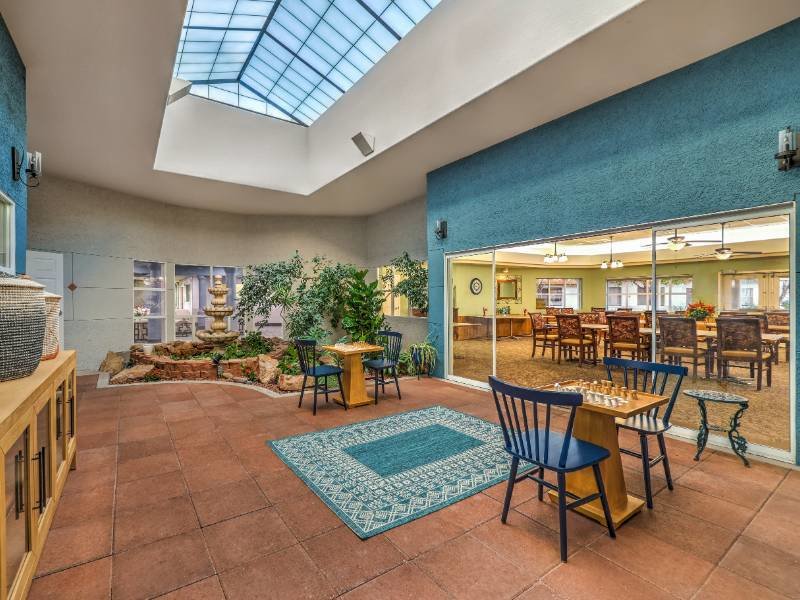 Chess Tables & Water Feature | River Run Senior Apartments