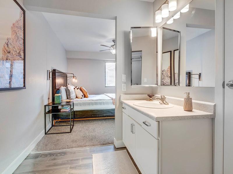 Bathroom and Bedroom | Santa Fe at Cottonwood Apartments in Cottonwood Heights, UT