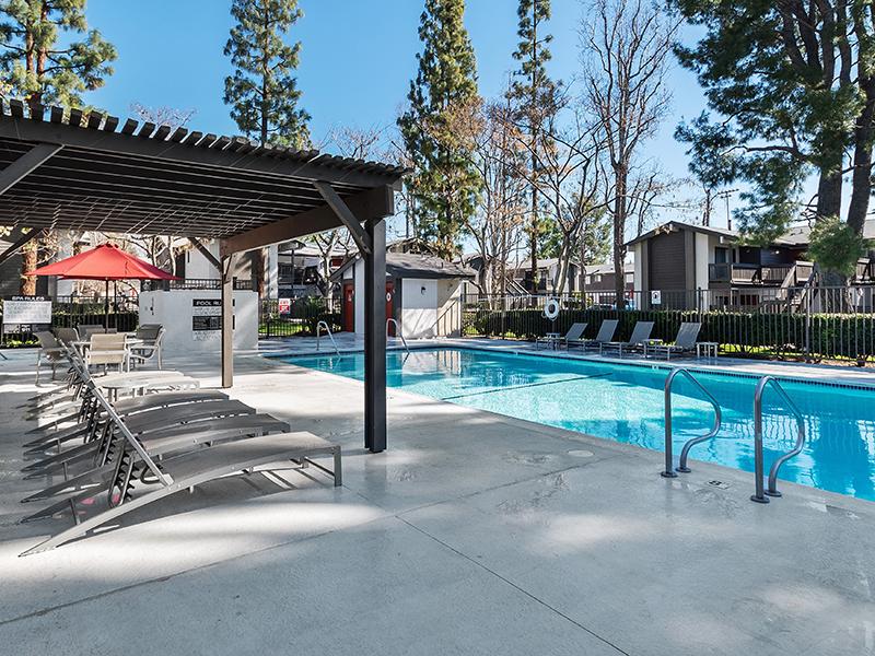Poolside Seating | Portola Redlands Apartments in Redlands, CA