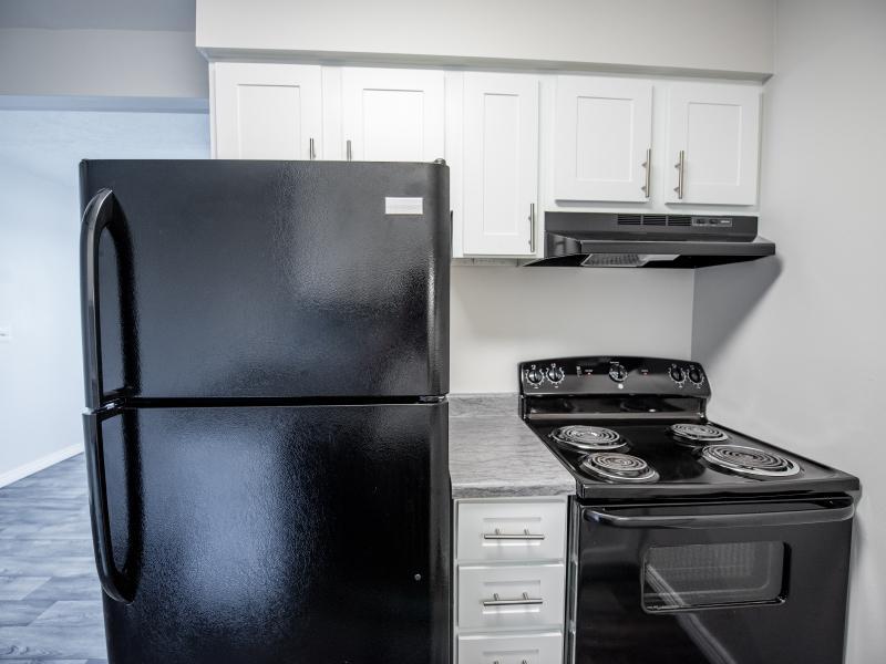 Kitchen Fridge and Oven | Holladay on Ninth Apartments in Salt Lake City UT