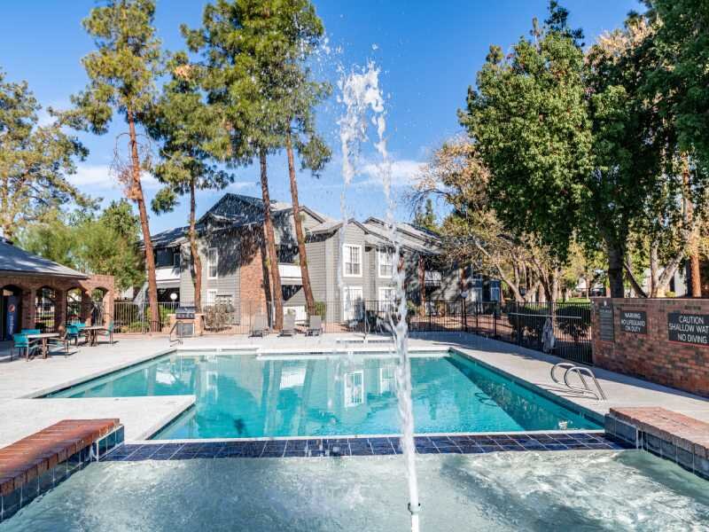 Pool with Water Feature | Cobblestone Apartments