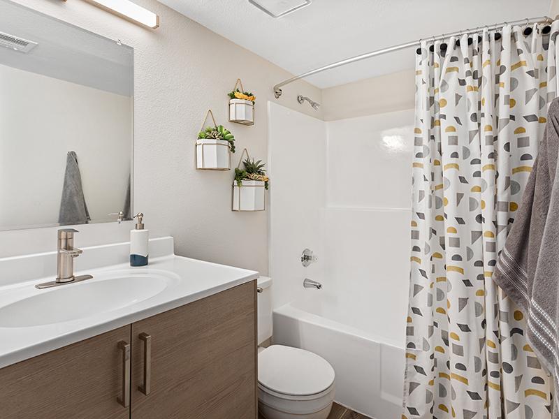 Bathroom with Tub | Portola West McDowell Apartments in Phoenix, AZ